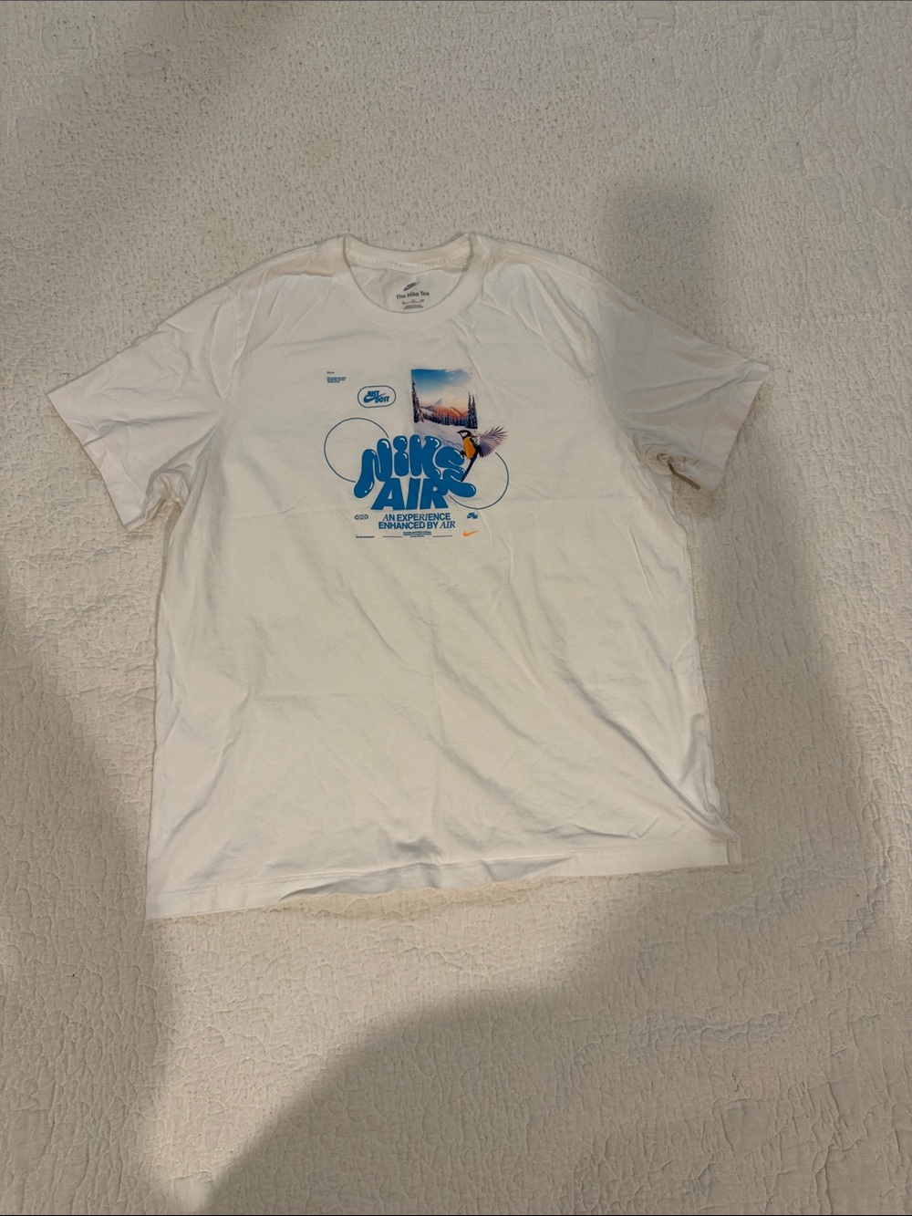 Nike White Short Sleeve T-Shirt with Blue Graphic